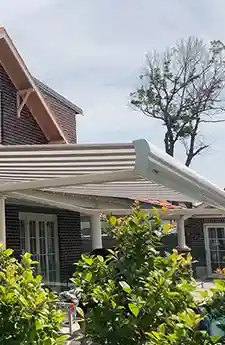 Modern patio with extended Semina semi-cassette awning