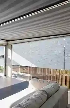 Sunlit outdoor space with Sotezza awning installed